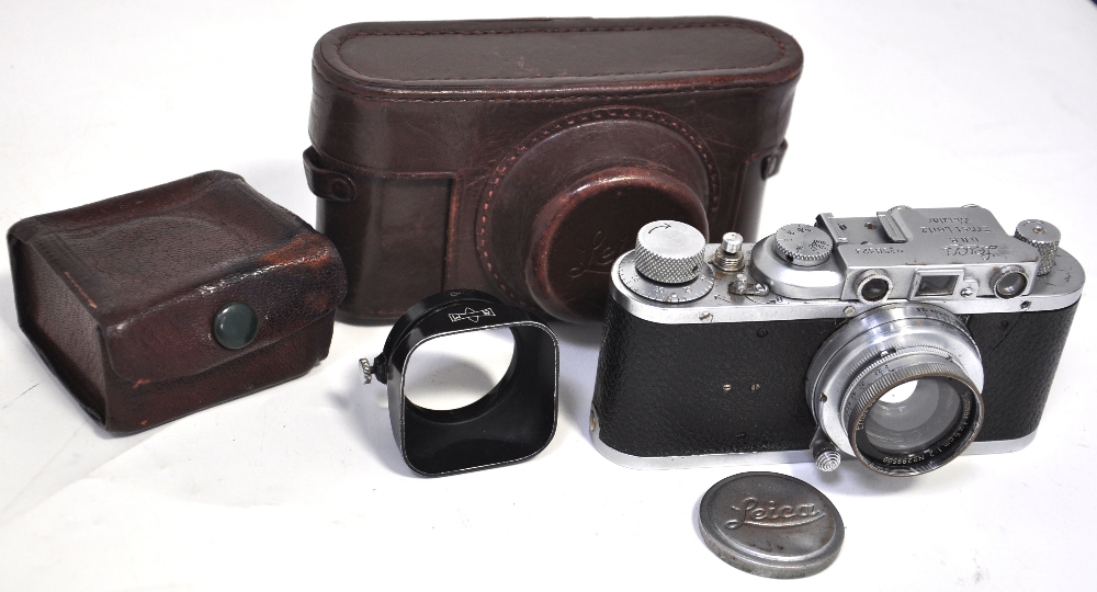 A Leica Model II with uncoated 5cm f2 Summar lens, Ever Ready case and associated lens hood in