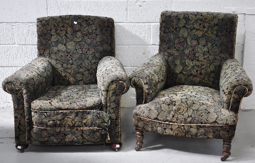 A pair of 20th Century Howard style upholstered arm chairs by Ray & Miles of Liverpool.