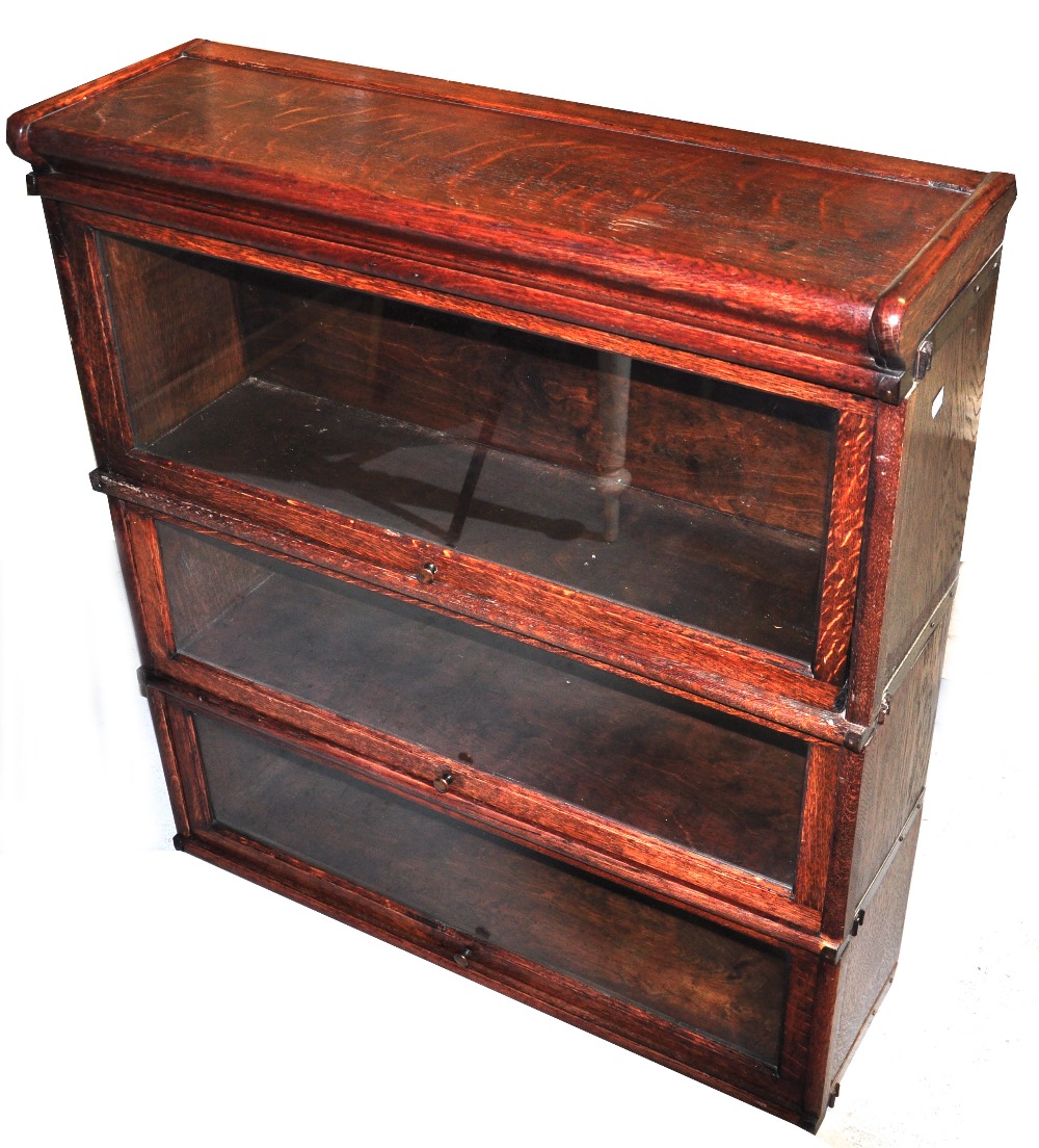 An oak 1920s three tier stacking bookcase, 96 x 86cm.