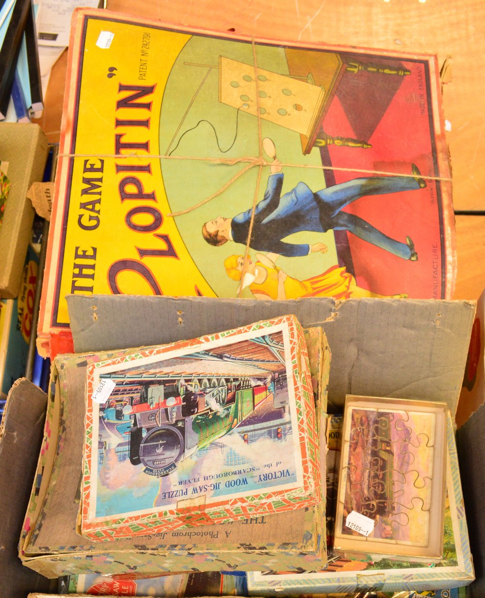A quantity of vintage games and toys including jigsaw puzzles.