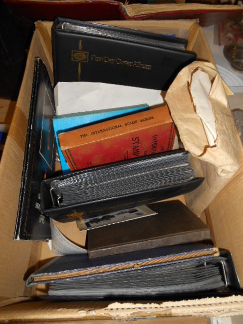 A Box of Postcard Albums & Stamps.