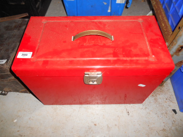 A Red Metal Tool Box.