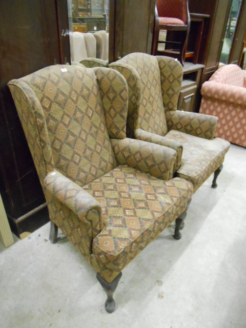 A Pair of Wingback Armchairs diamond patterned upholstery.