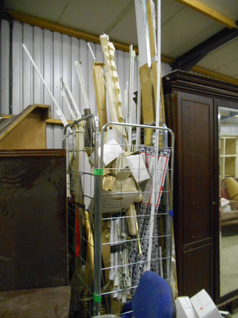 A Collection of Curtain Poles & Rings, Powerglide Rails, etc. (metal cage not included).