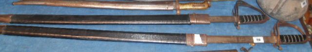 Two Indian Swords with Scabbards.
