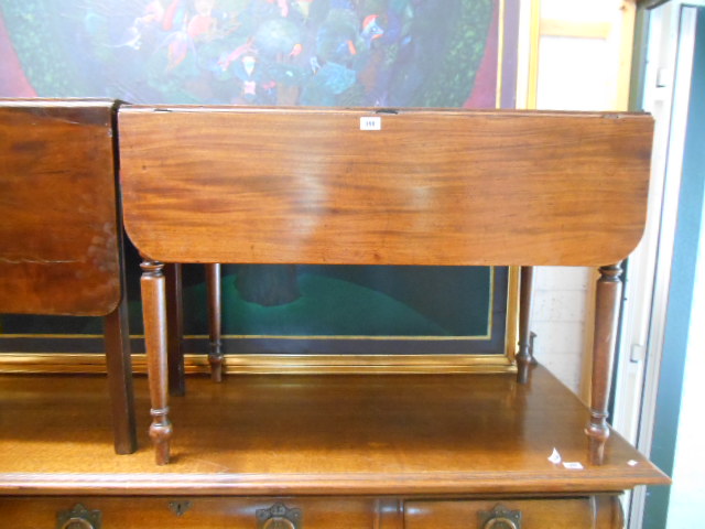 A 19th Century Mahogany Pembroke Table, standing on four turned legs. 96cm wide.