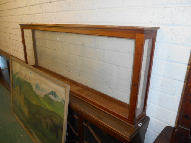 A 19th Century Mahogany Glazed Shop Display Case of Large Proportions, 2`1"" x 5`8"" x 8"".