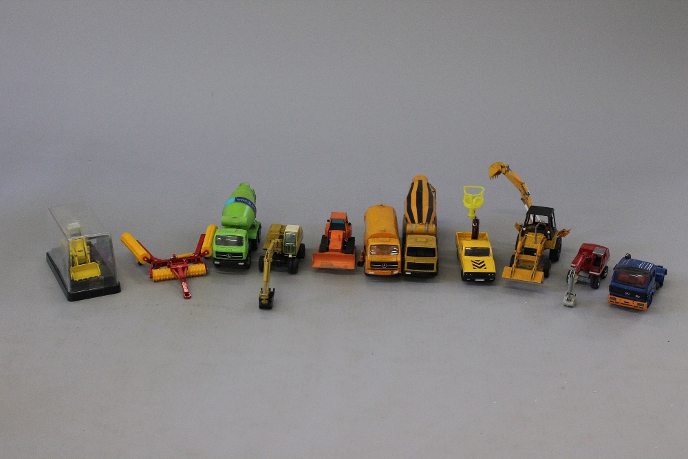 11x assorted diecast construction vehicles which include: Corgi; Gescha; Conrad; Case; etc.