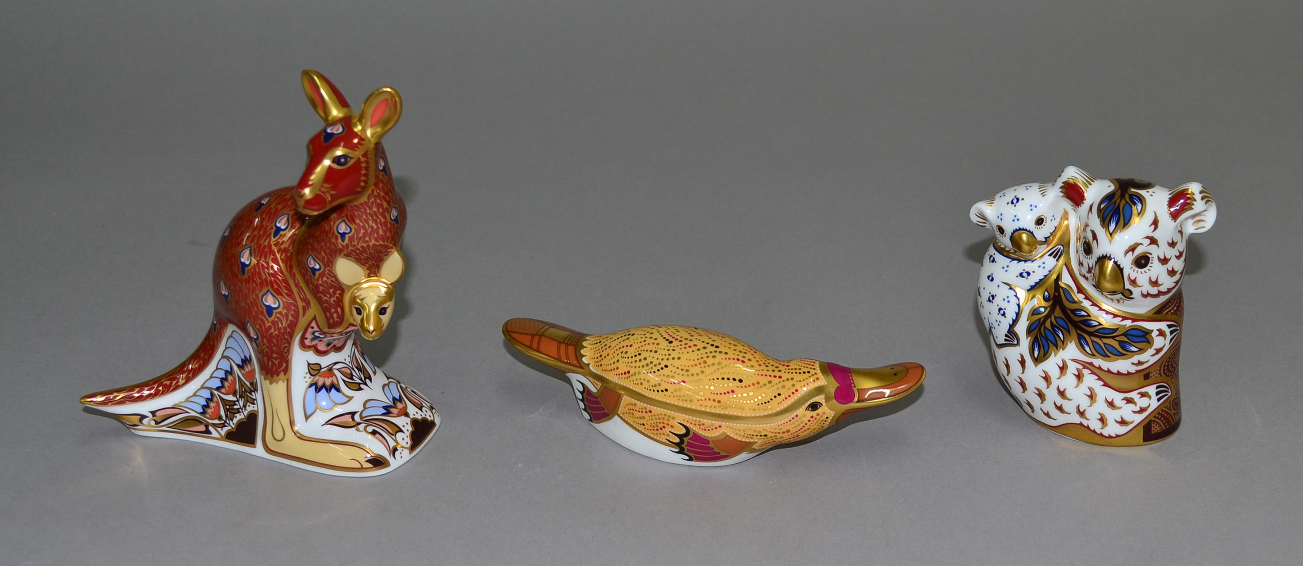 Three Royal Crown Derby paperweights from the Australian Collection: `Duck-Billed Platypus`; `
