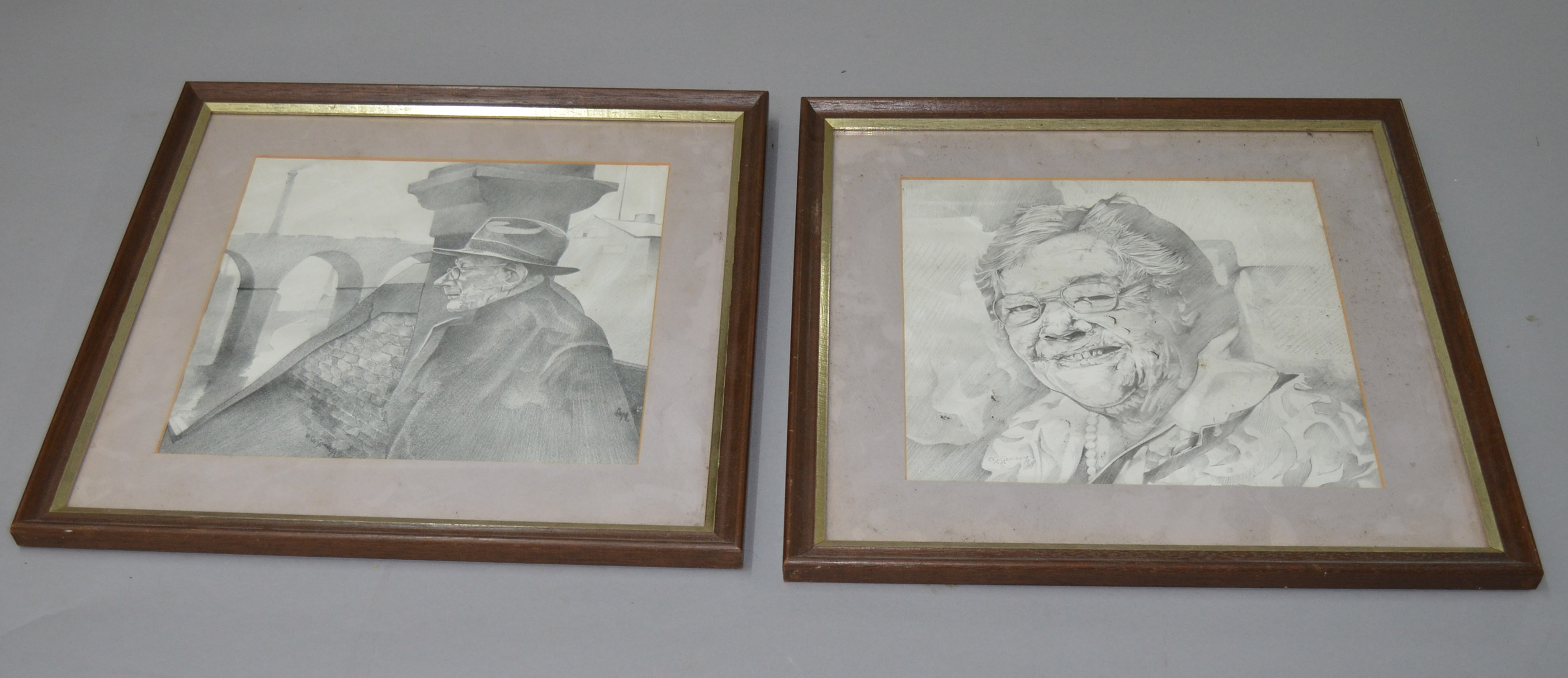 Garnery, G: two portrait prints of Lowry and companion, framed and glazed (height 27cm, length
