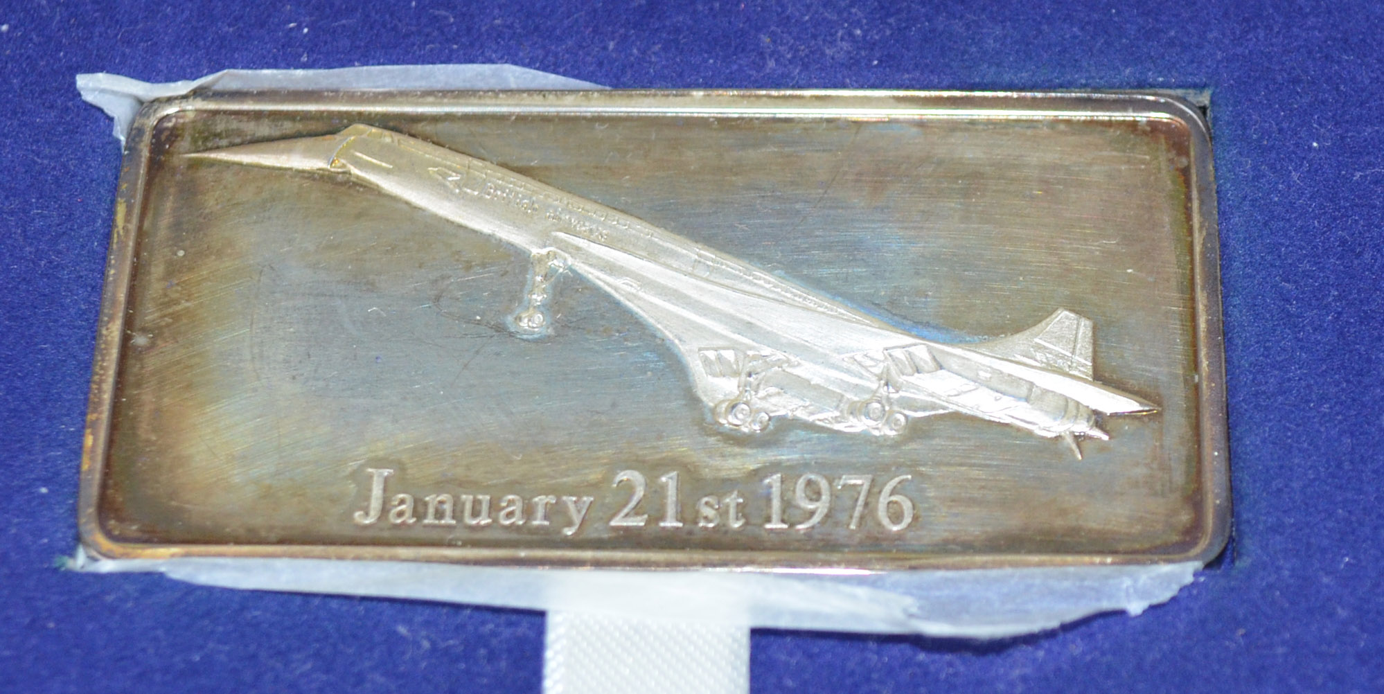 Danbury Mint white metal ingot commemorating the inaugural flight of Concorde. In case with