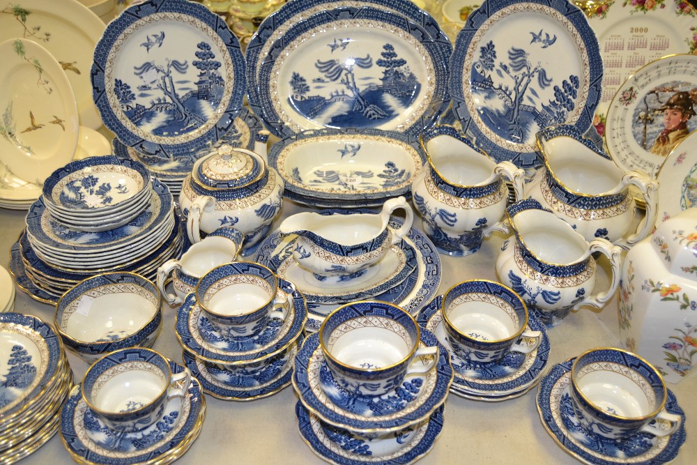 A Booths Real Old Willow pattern part breakfast and dinner service, comprising a graduating trio