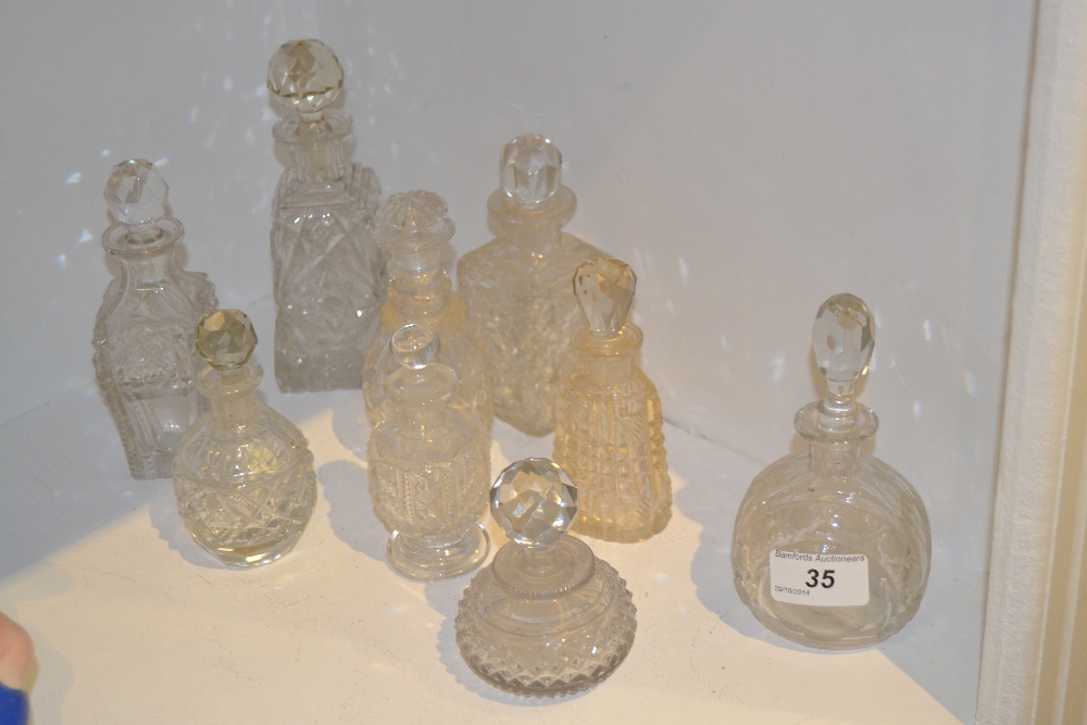 Glassware - nine various cut glass scent bottles and stoppers