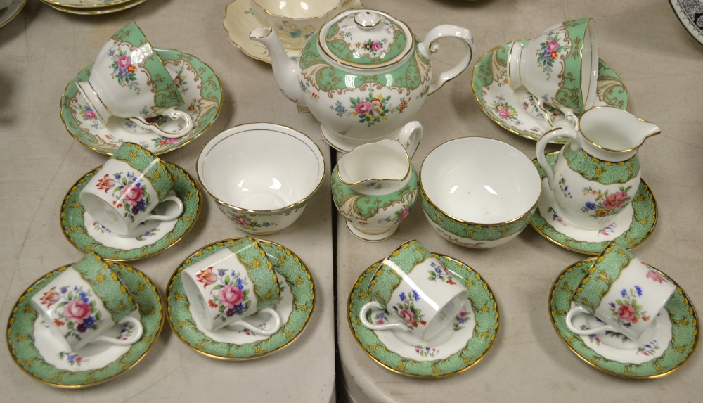 Ceramics - an Aynsley coffee service, transfer printed and coloured with flowers, pattern no.