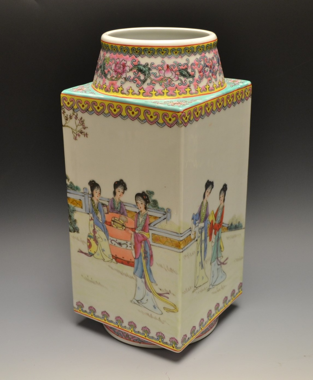 A Chinese Famille Rose square sided vase, painted with concubines in a garden, 28.5cm high,