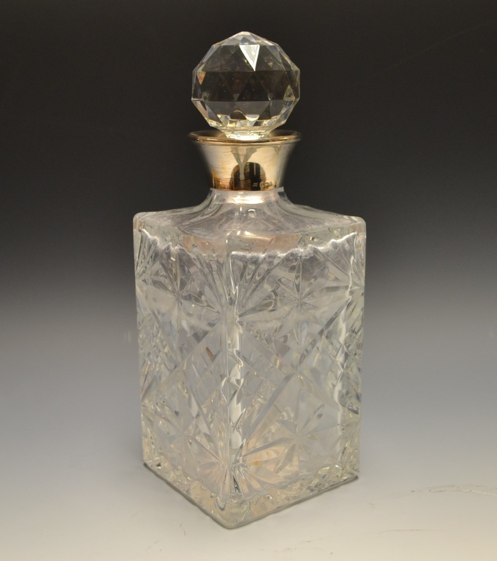 A silver collared  cut glass decanter, Sheffield, 1981