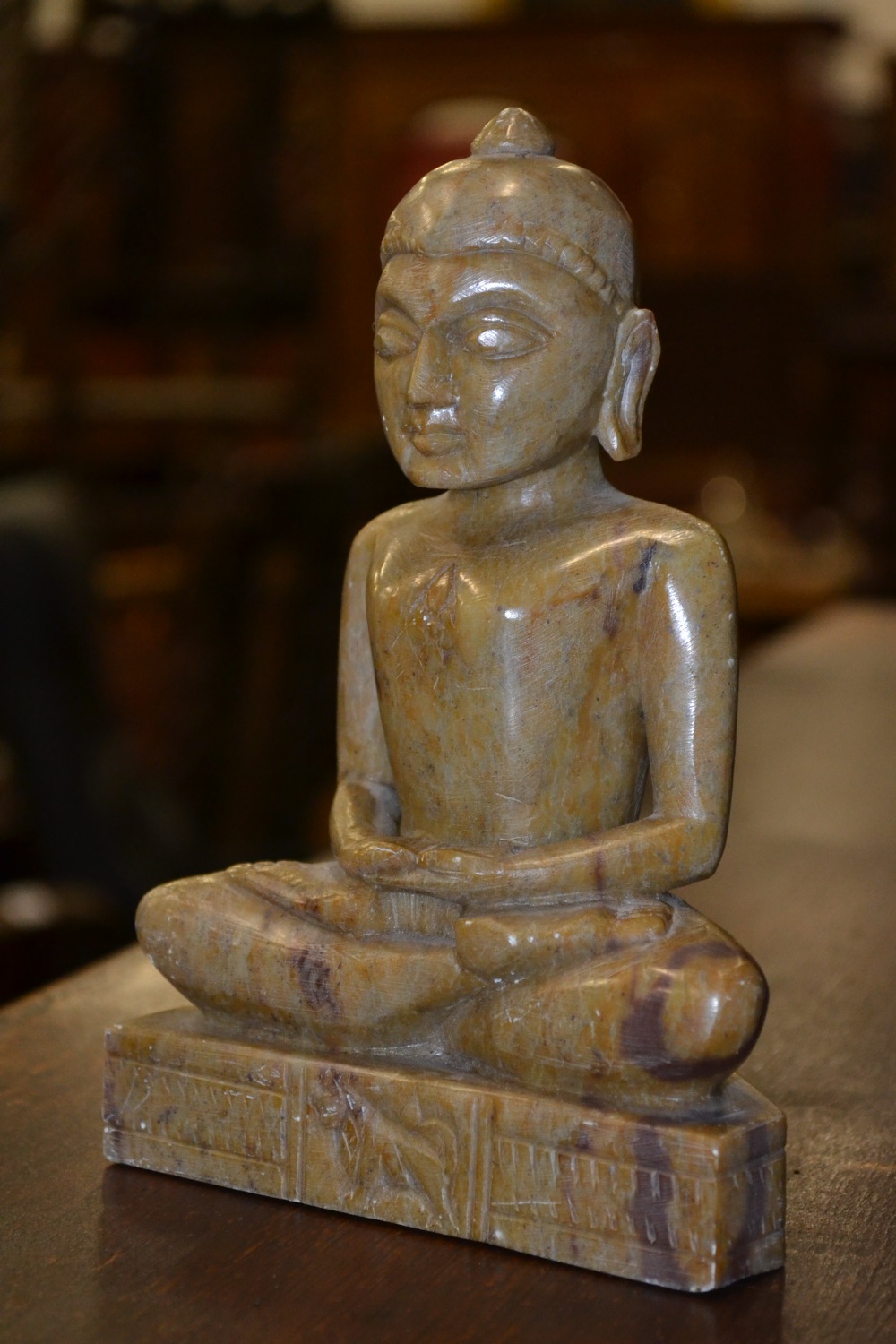 An Asian soapstone Buddha