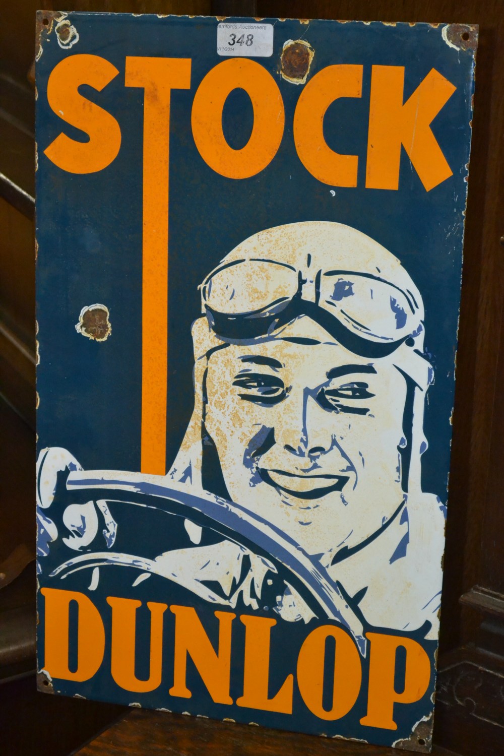 A Stock Dunlop enamel sign