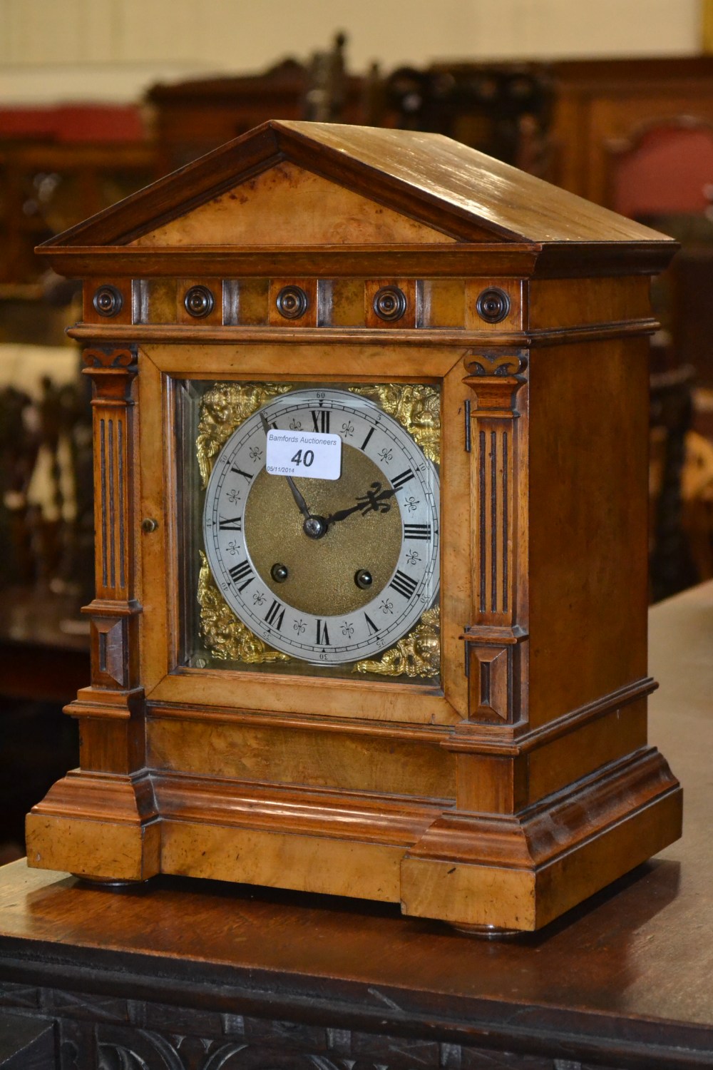 A Victorian walnut cased mantel clock, c.1890