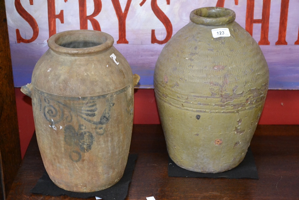 A Chinese celadon type glazed jar; another, similar (2)