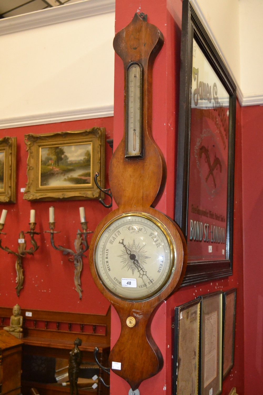 A Victorian mahogany wheel barometer