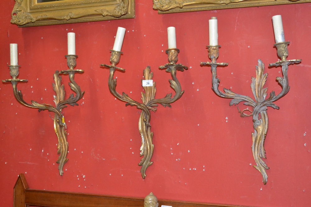 Three Rococo style wall sconces