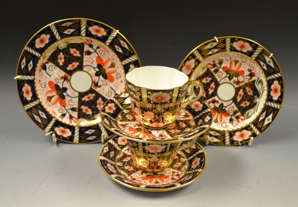 Royal Crown Derby 2451 pattern cups, saucers and side plate