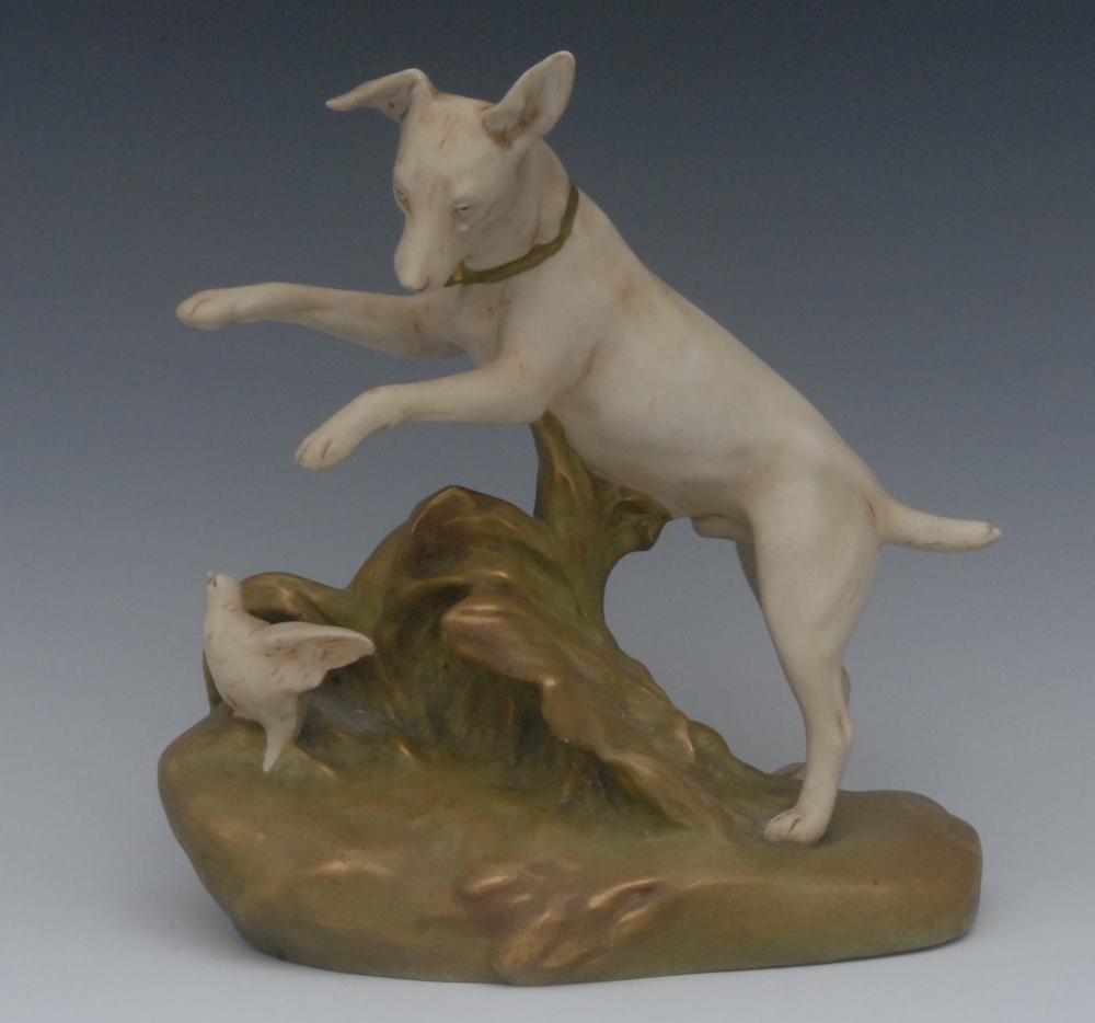 A Royal Dux model, of a dog, on hind legs startling a bird, 23cm high, model no. 1567, pink triangle