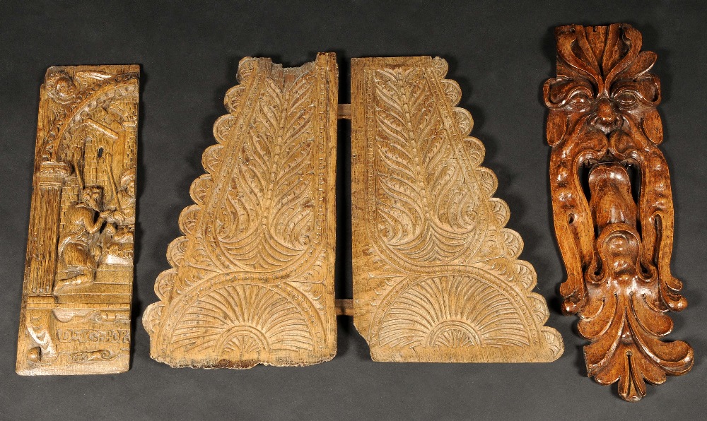 A 17th century carving, of a foliate mask, 60cm long, c.1650; others (4)