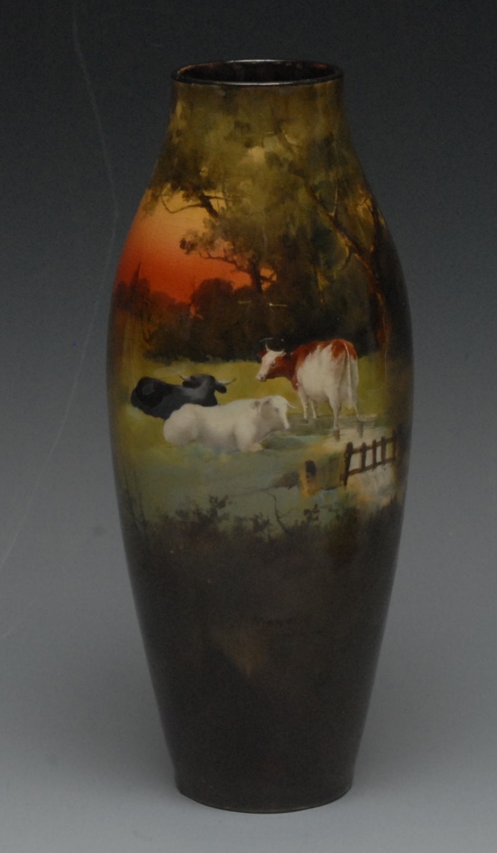 A Royal Doulton ovoid  vase, painted by H Murray, signed, with cattle in a landscape, 21cm high,