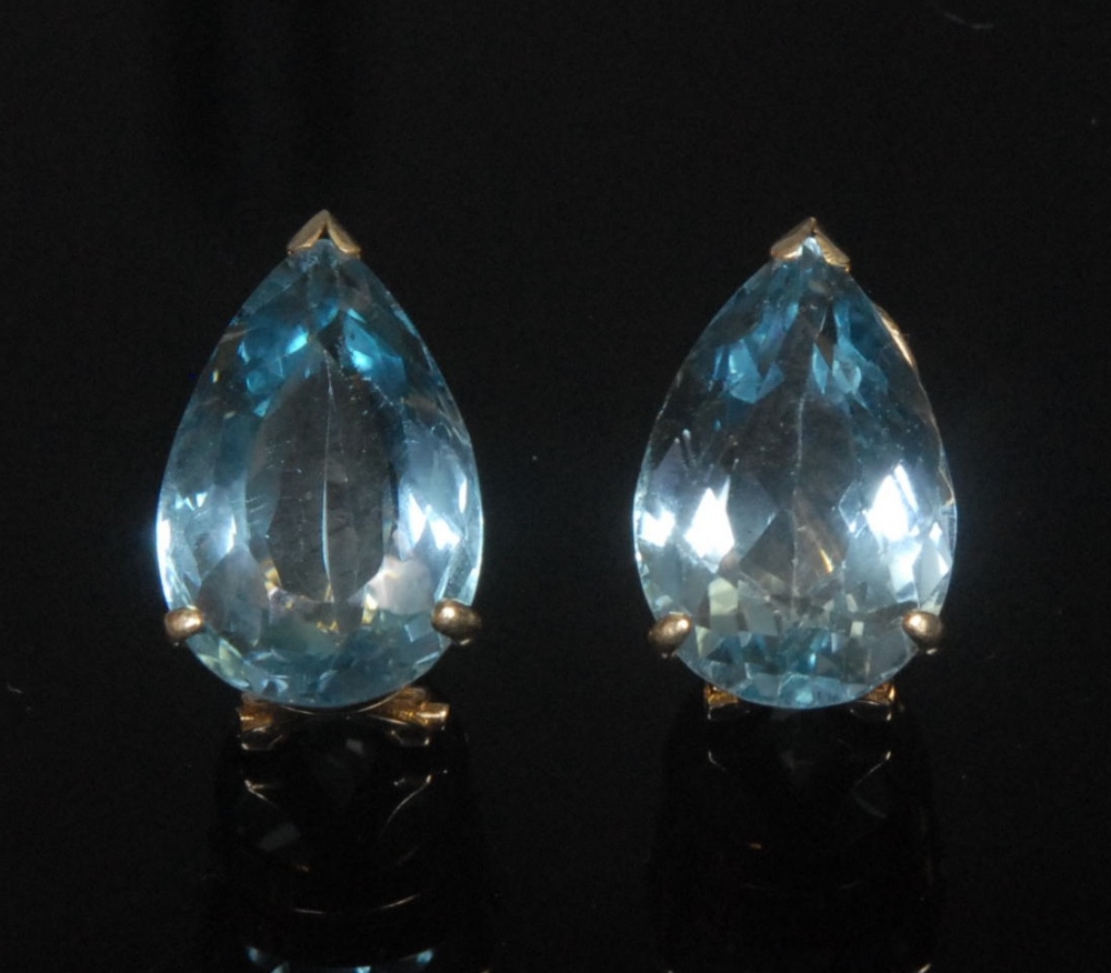 A pair of aquamarine tear drop ear clips, each stone approx 7.5ct, 15ct yellow gold mount and pin,