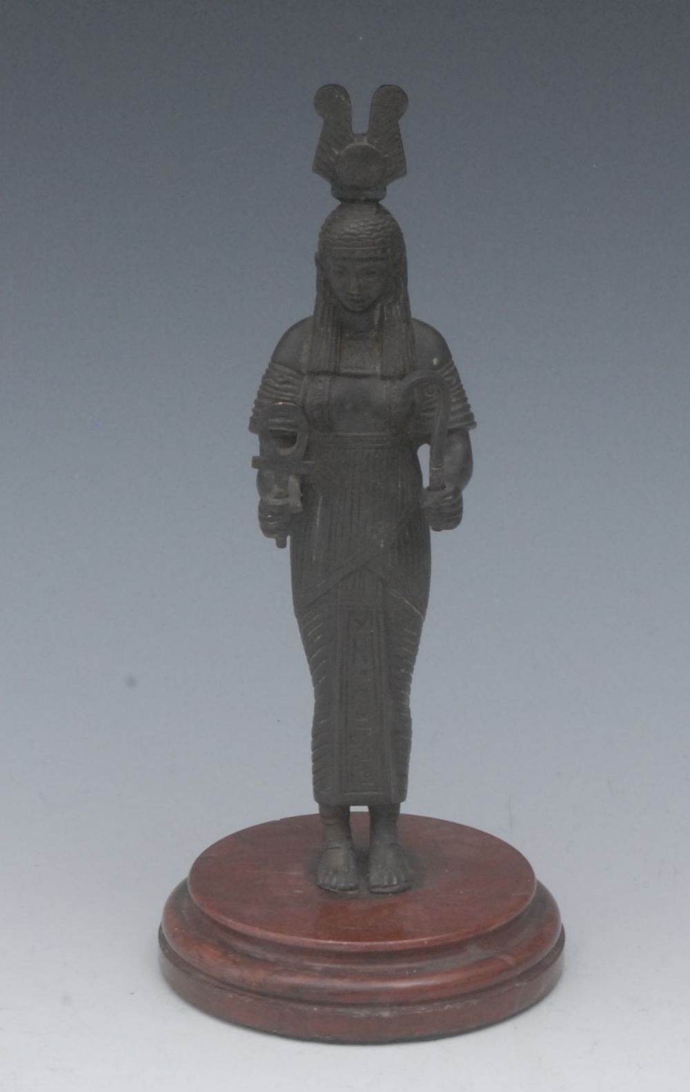 English School (19th century), a dark patinated bronze, of the goddess Isis, she stands, holding