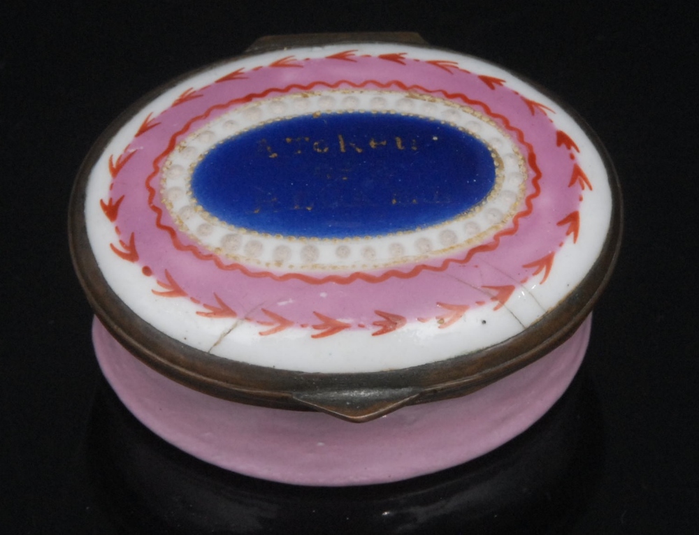 A George III South Staffordshire enamel oval patch box, hinged cover inscribed in gilt A Token of
