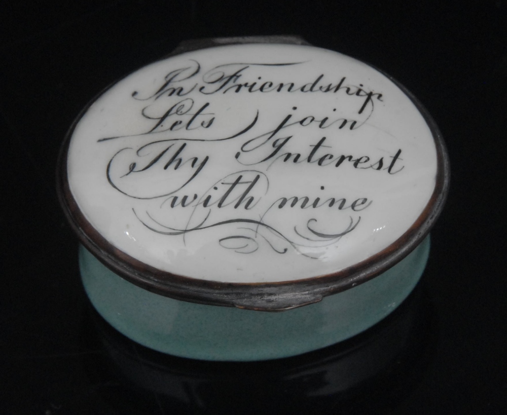 A George III South Staffordshire enamel oval patch box, hinged cover inscribed In Friendship Let's