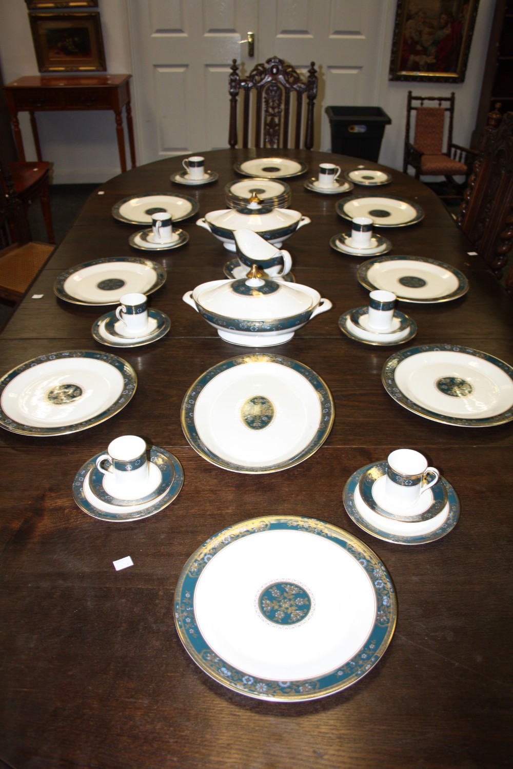 A Royal Doulton Carlyle, H.5018 dinner service,for eight, comprising a pair of covered tureens, meat