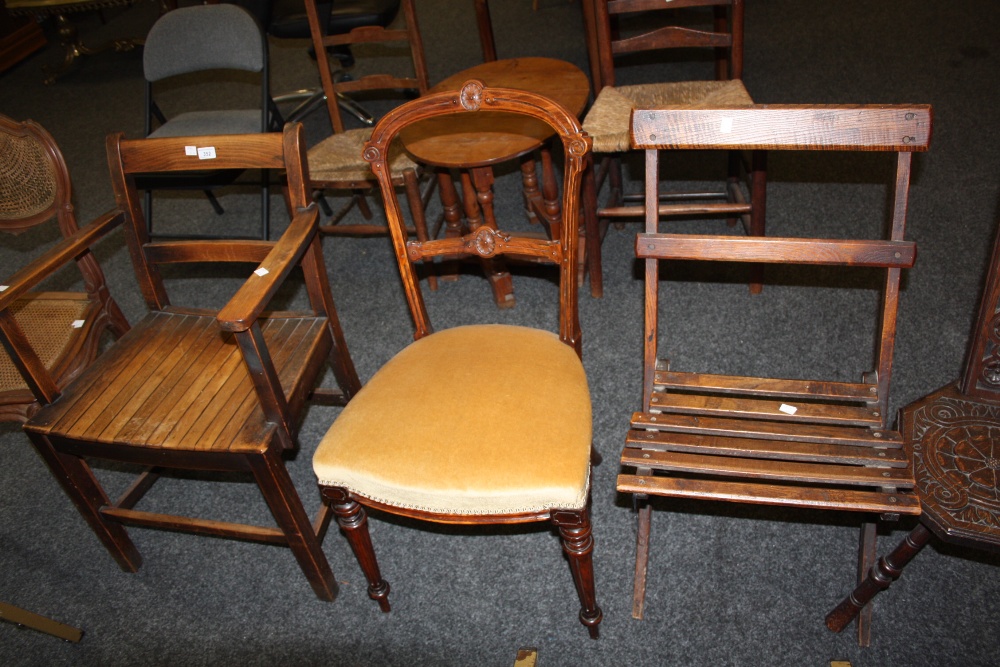 A carved oak spinning chair, a bergere style hall chair; others (5)