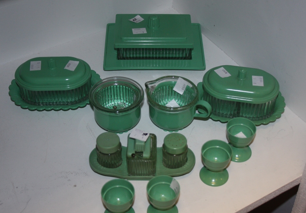 A mid 1940's breakfast set, comprising of a butter dish, egg cups, condiment set, etc