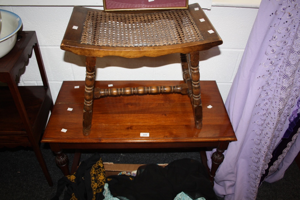 A mahogany coffee table; an oak stool