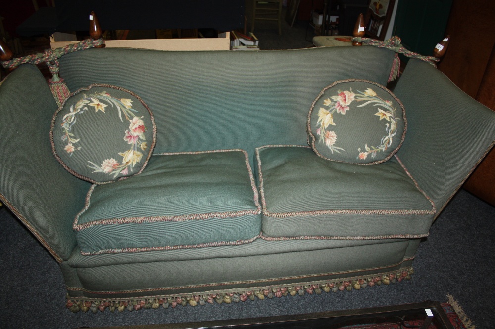 A Knoll type sofa, upholstered in green