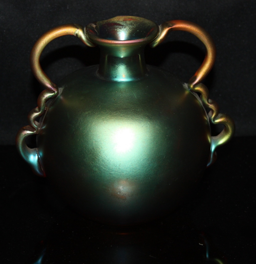 A W.M.F. Ikora iridescent globular vase, shaped handles, 14.5cm high, c.1905   Condition Report:
