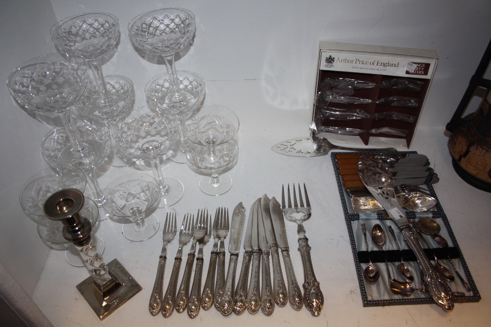 Glass- a set of seven crystal champagne coupes; others
Metalware - a silver plated fish service,