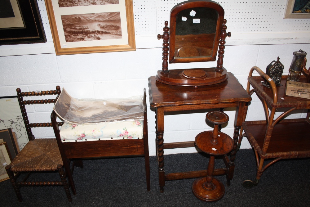 A Victorian mahogany toilet mirror; a 1930s oak barley twist occasional table; a piano stool; a
