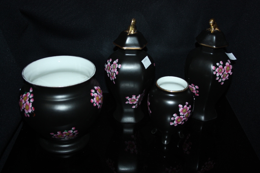 Carlton Ware - Cloissone Pattern - a pair of hexagonal baluster vases and covers, decorated with