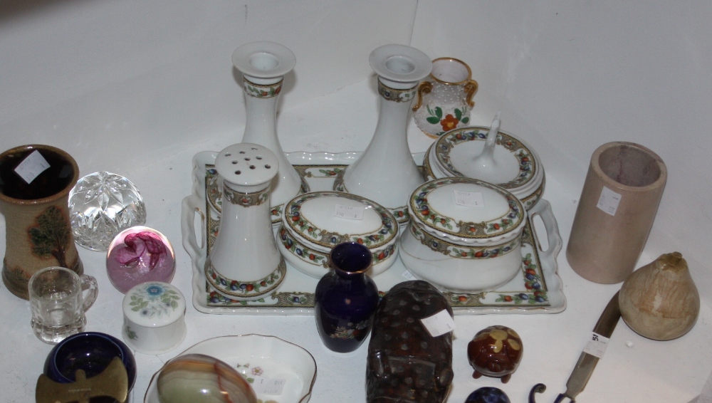 A Czechoslovakian dressing table set, garlands of fruit, comprising tray, a pair of candlesticks,