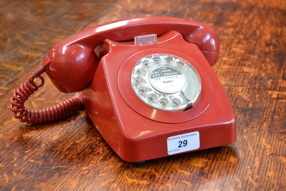 A vintage red telephone