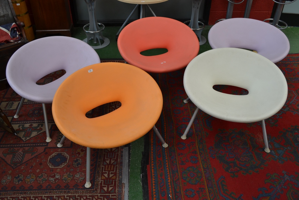 Five retro Kartell armchairs Ploof by Starck