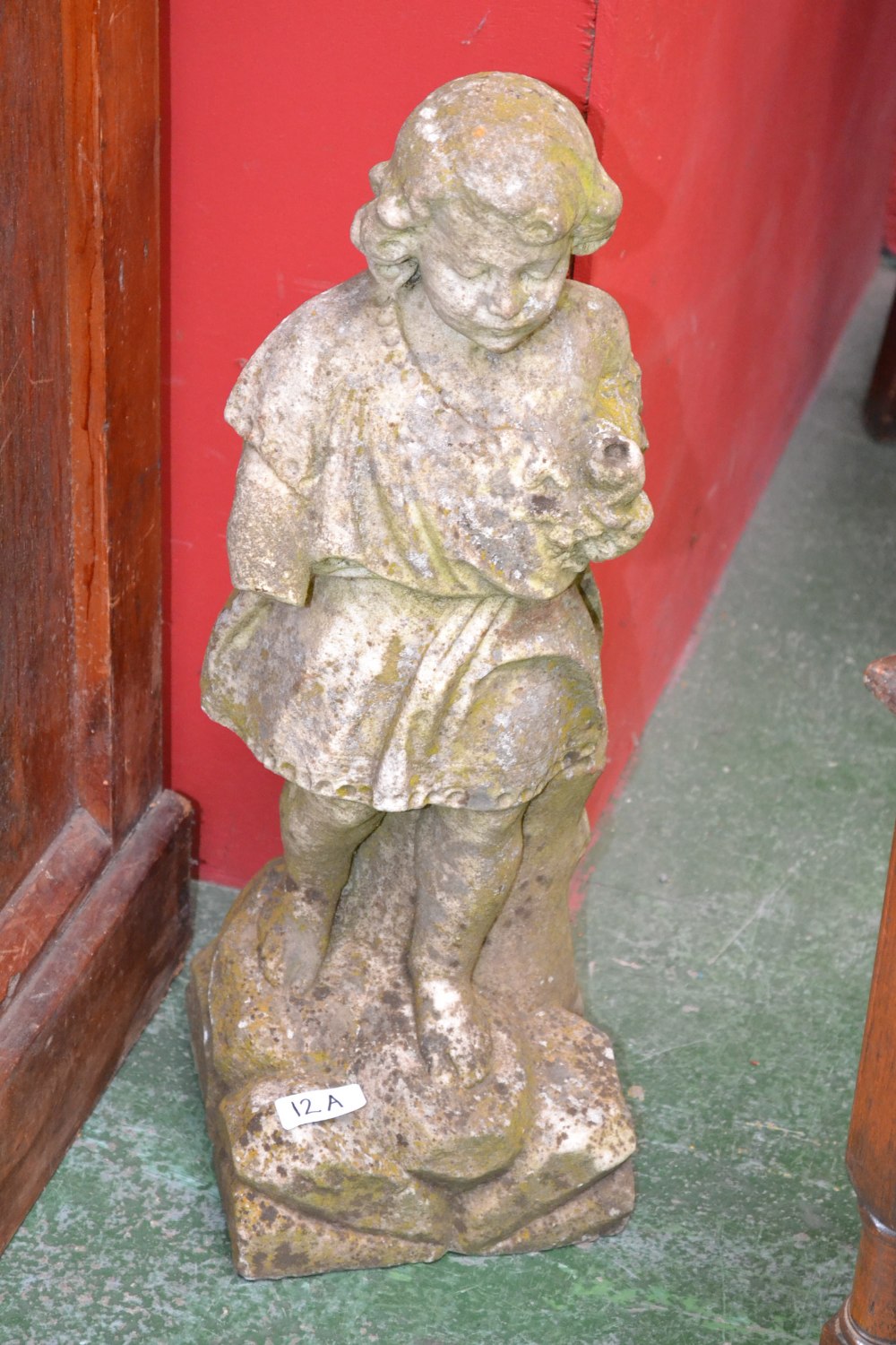 A marble garden statue, of a young boy in Classical dress, 52cm high