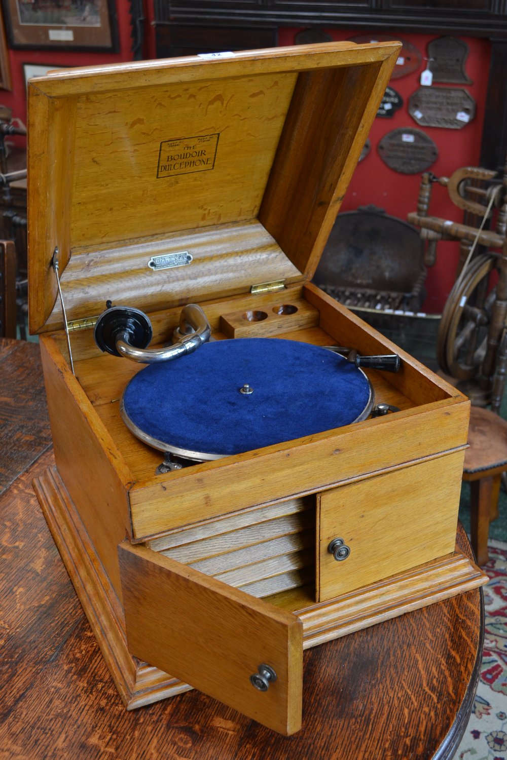 An oak cased Boudoir Dulcephone record player, retailed by Keith Prowse & Co. Limited, London