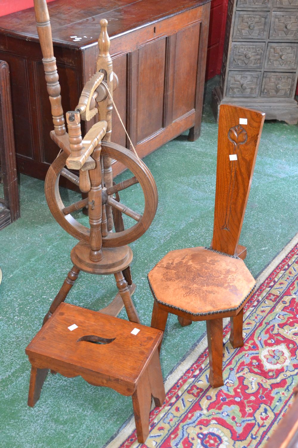 A spinning wheel; a spinning chair; a stool (3)