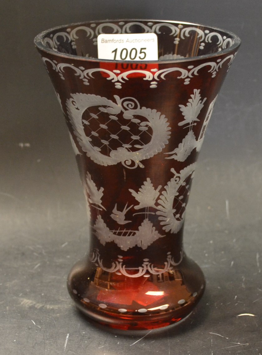 A 19th century Bohemian ruby overlay tapering cylindrical vase, 17cm high